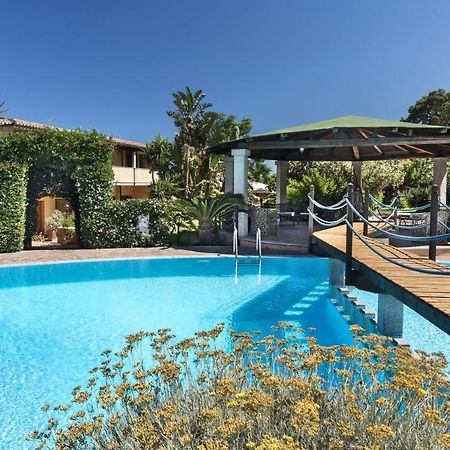 Relais Fenicottero Rosa Guest House Porto Taverna Exterior photo